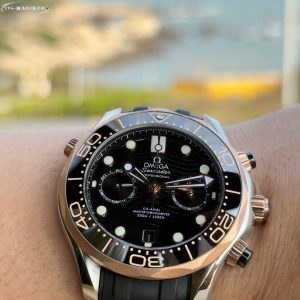 Alternative view of TVS-Omega OMEGA OT New Seamaster 300M 44mm Chronograph Watch TVS Factory1-1 Exclusive In-House Developed 9900 Movement with Identical Functions to Original, Dual-T Black Balance Wheel Movement.3 o'clock position features 12-hour and 60-minute chronograph subdials. 1: Brand-new Seamaster 300M ceramic dial with distinct lines and translucent gloss. 2: Case sandblasting exhibits fine, consistent texture matching the original, with no broken lines. Authentic conical exhaust valve. Bezel rotation produces crisp, smooth sound.3: The ceramic bezel's markings and text utilize "white enamel" technology, resisting yellowing to maintain a pure white luster with brighter lettering.          4: The high-precision 9-link steel bracelet undergoes meticulous polishing on each link to ensure flawless assembly. The adjustable end links provide a snug fit, while the extended clasp offers enhanced comfort and is interchangeable with the original. "TVS Craftsmanship: Guaranteed Excellence" Exquisitely recommended multifunctional mechanical wristwatch for men.